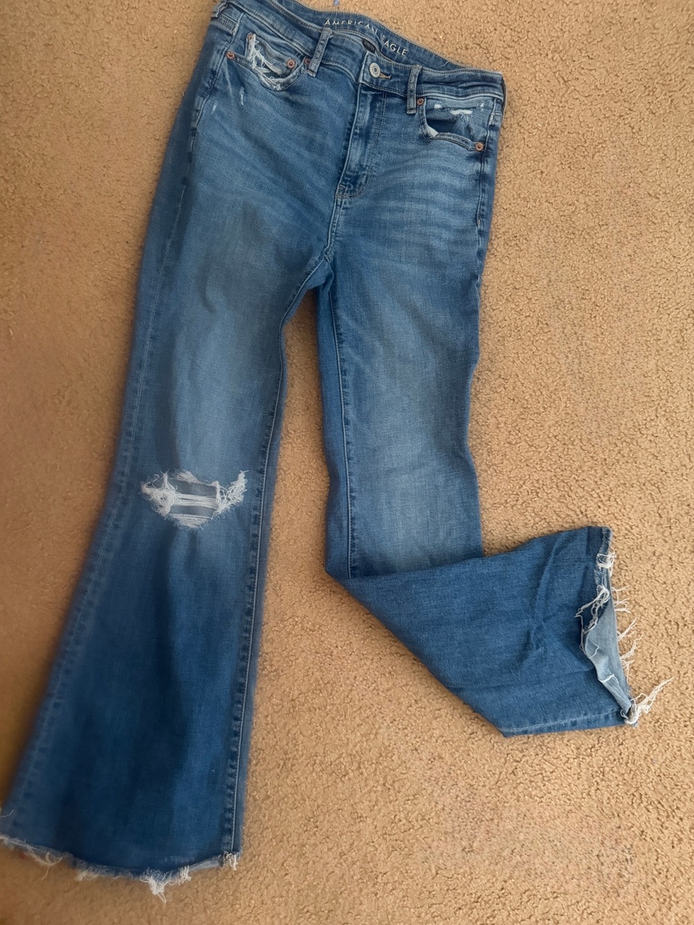 American Eagle Next Level super high-waisted ripped flare jeans